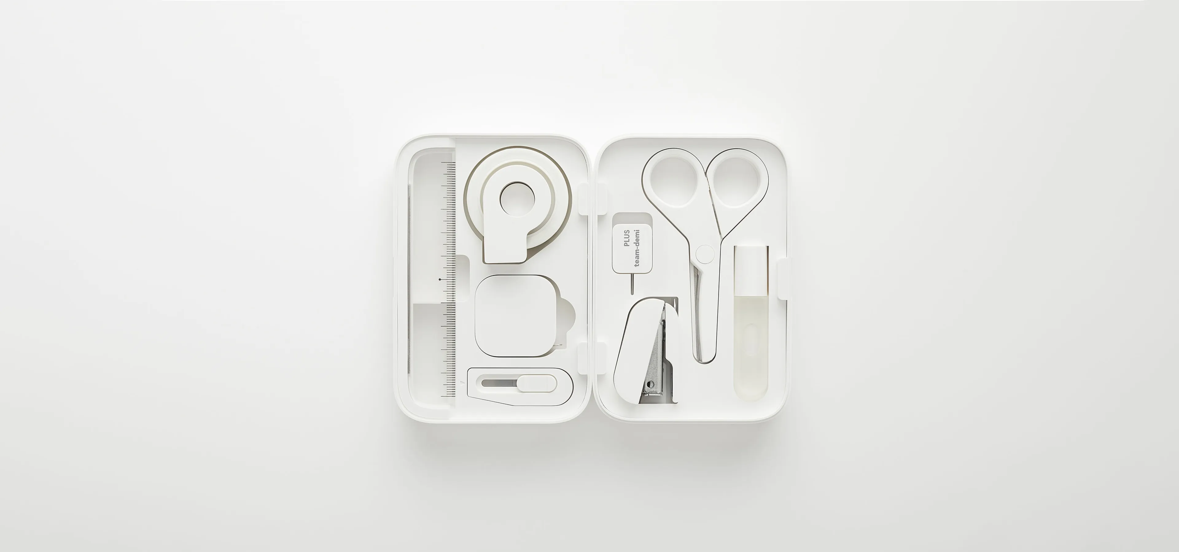 A minimalist portable stationary set in white by Team Demi