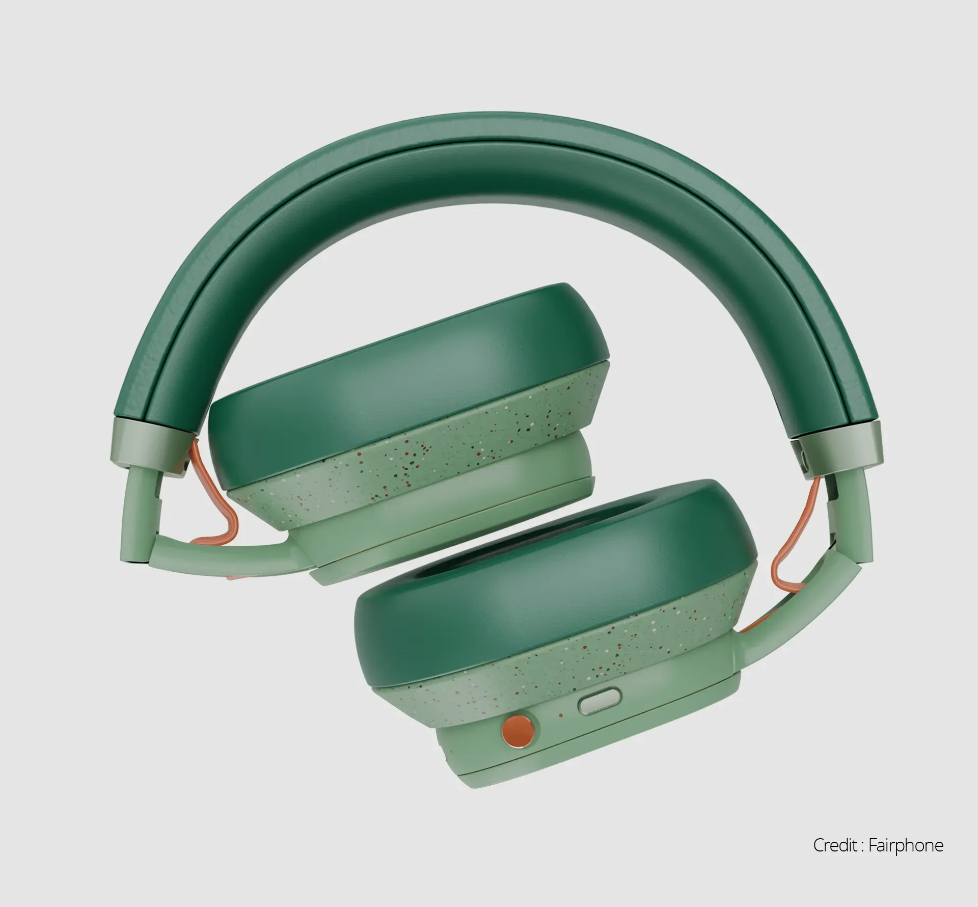 Folded up Fairphone headphones in green