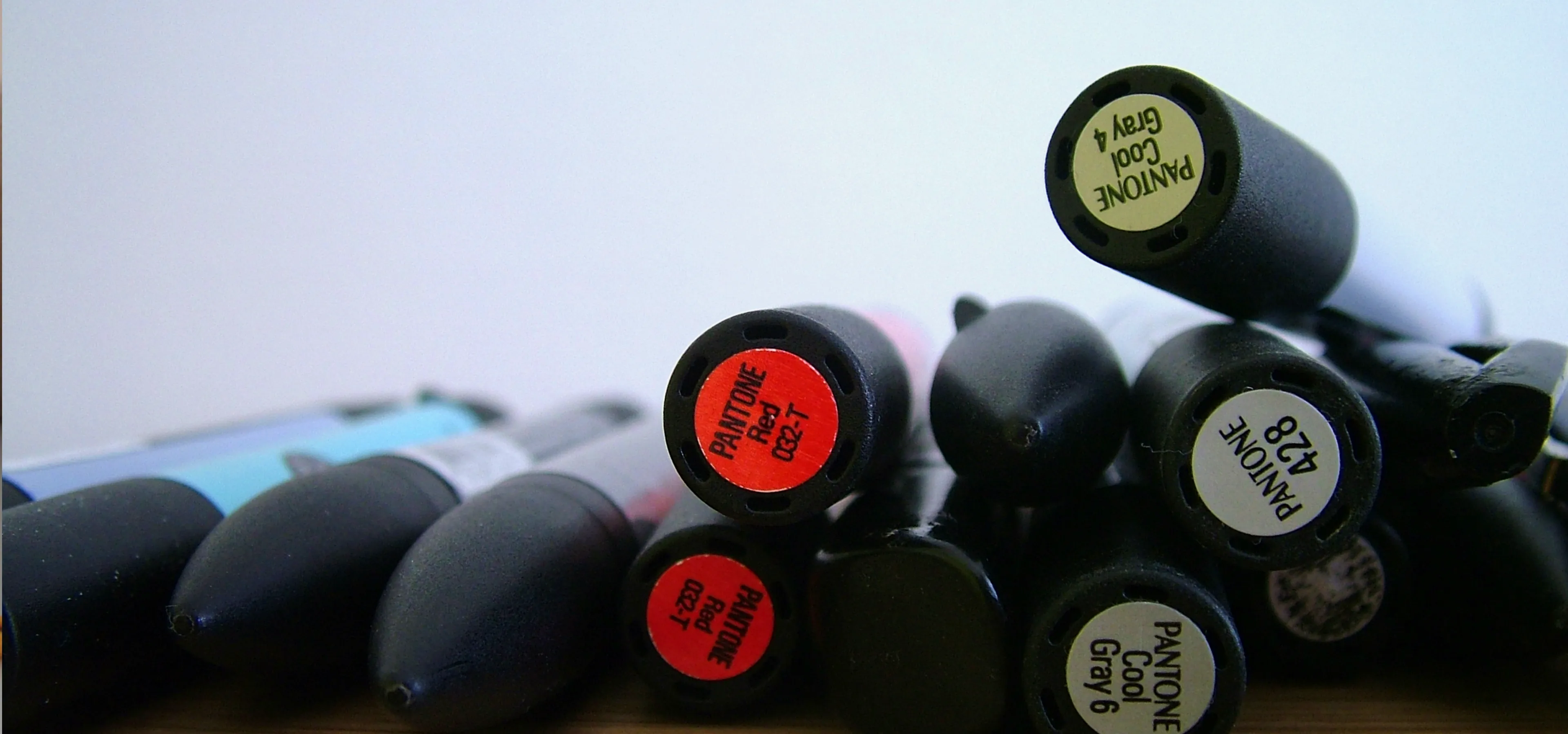 a bunch of pantone markers