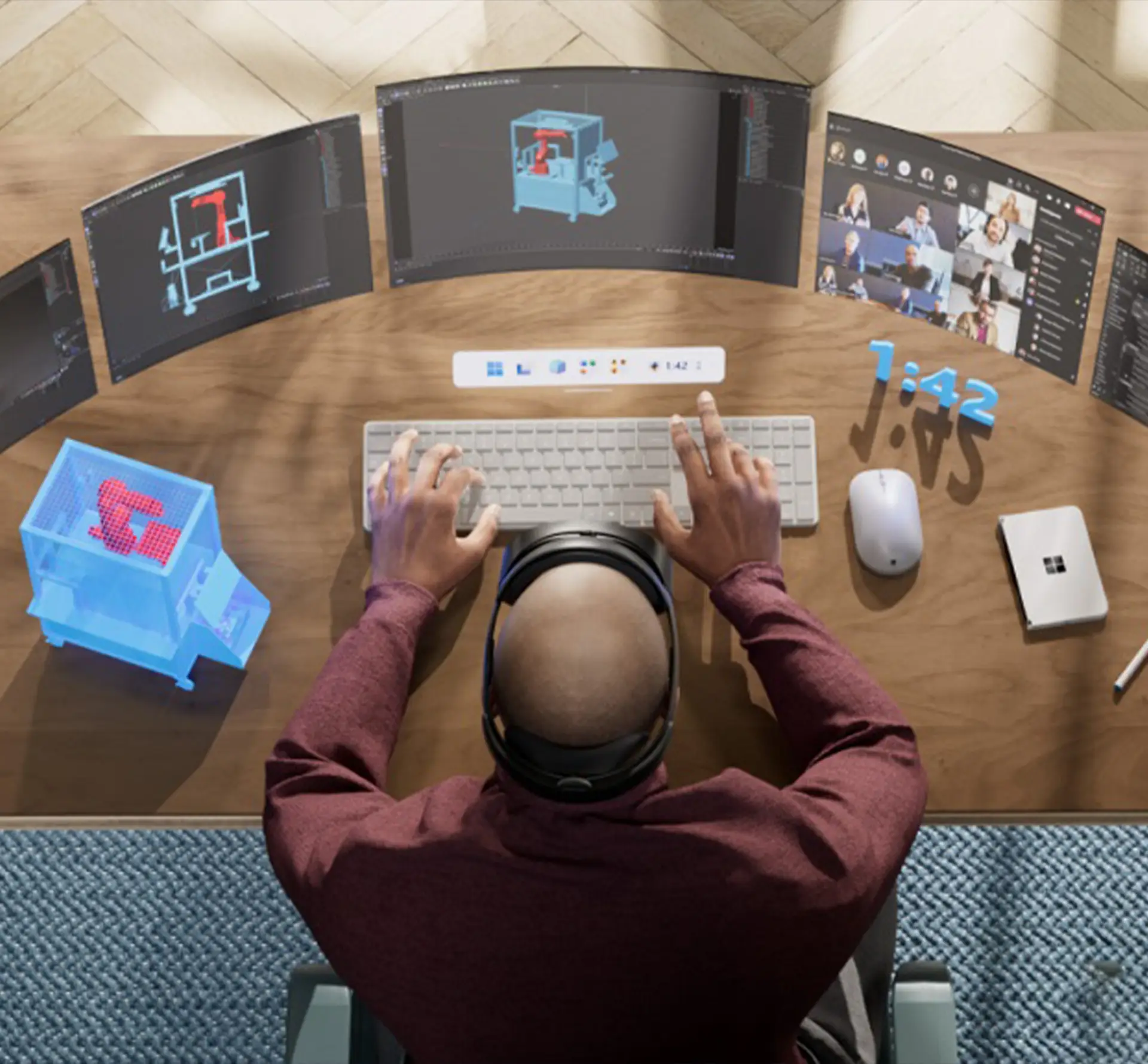 man at a desk and keyboard using Mata VR workspace