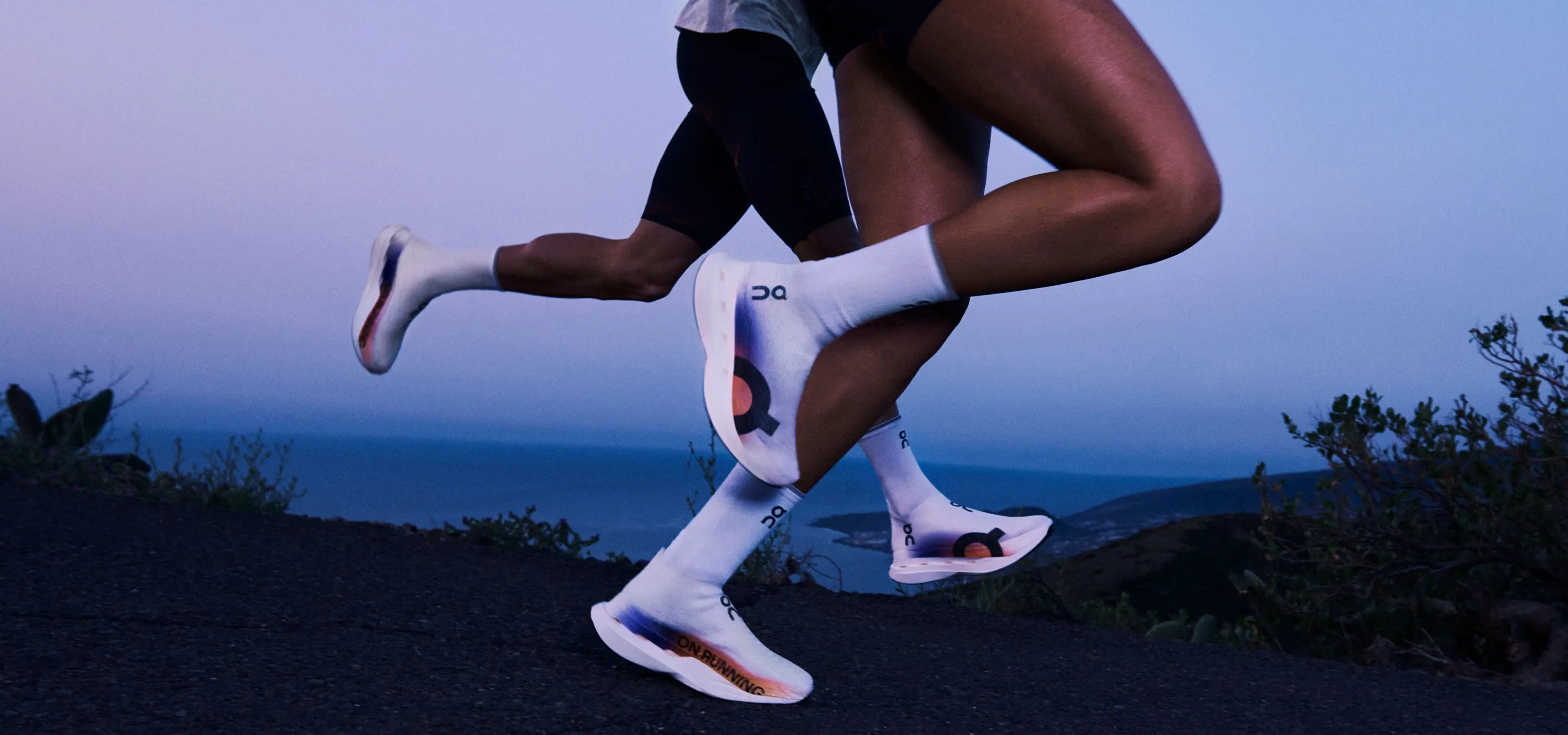 two runners wearing on trainers