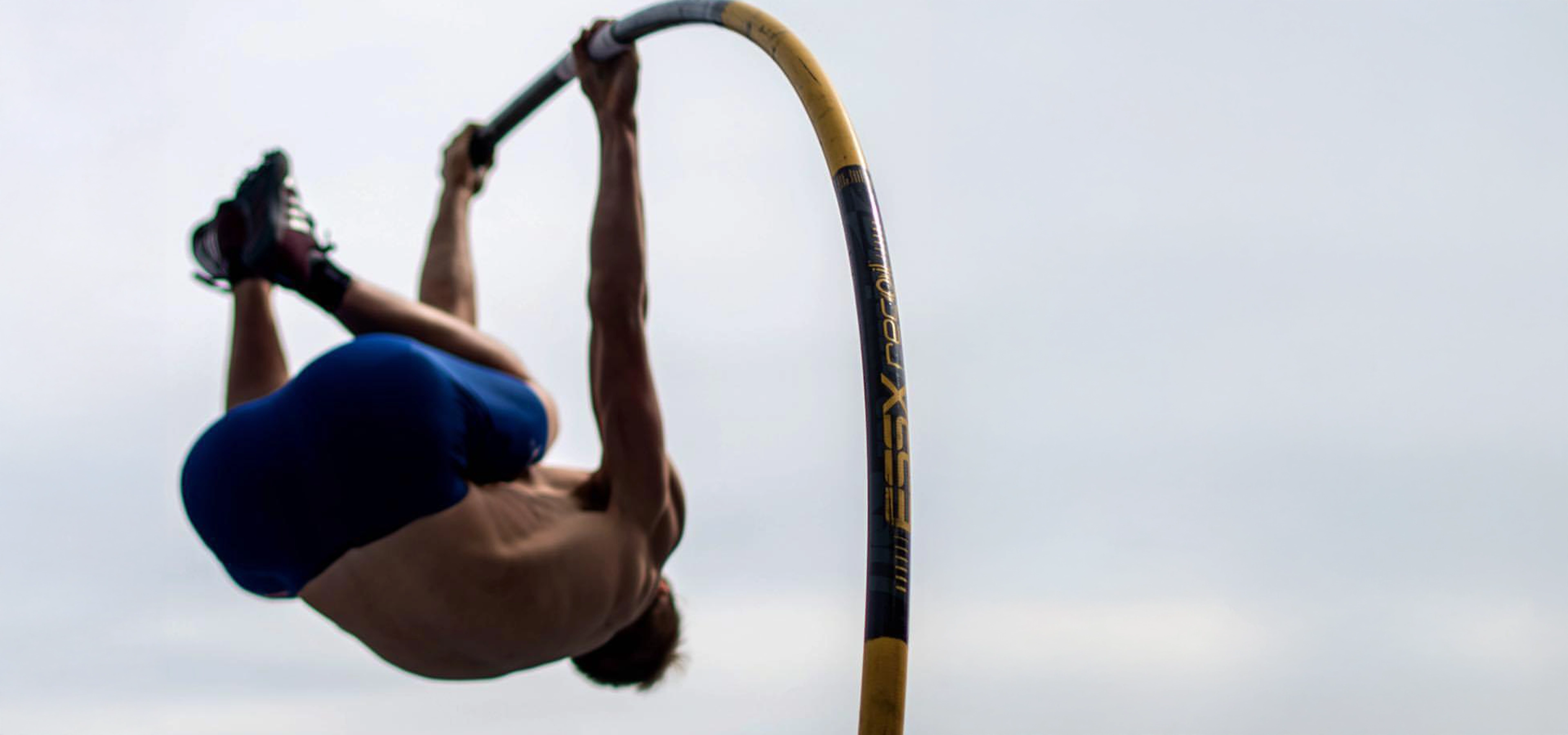 Pole vaulter mid air