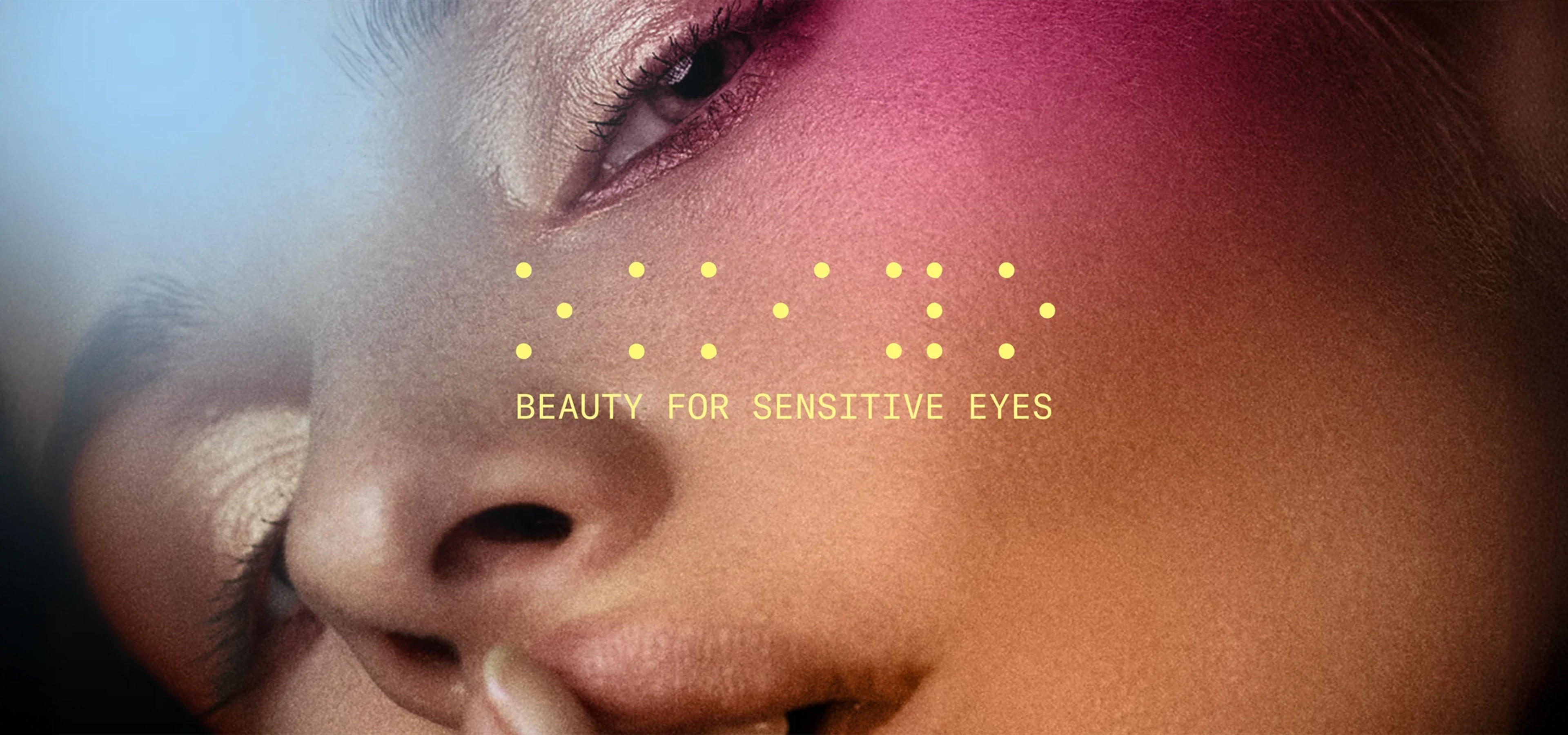 Woman with blue and pink lights on her face