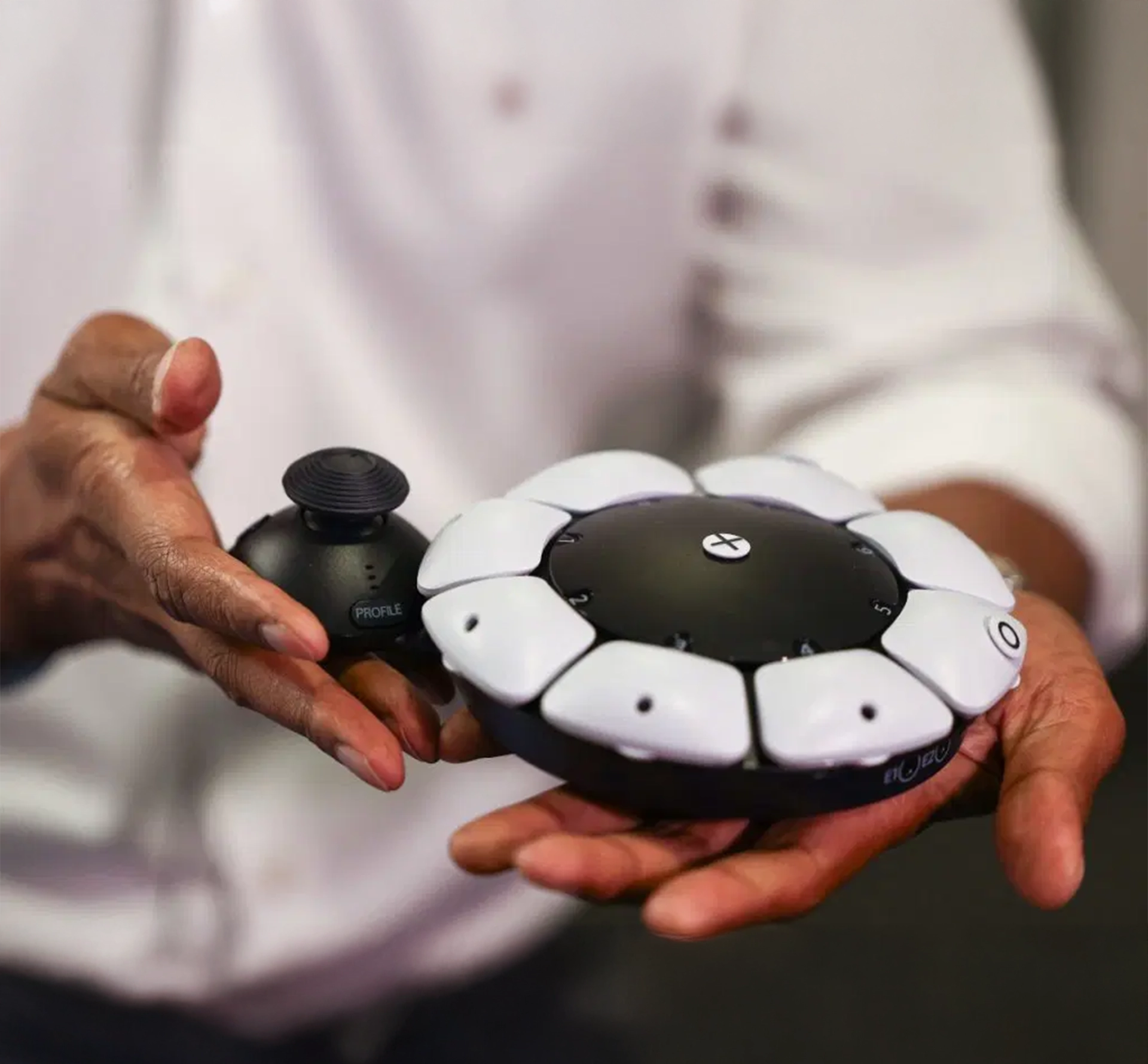X box controller being held in hands