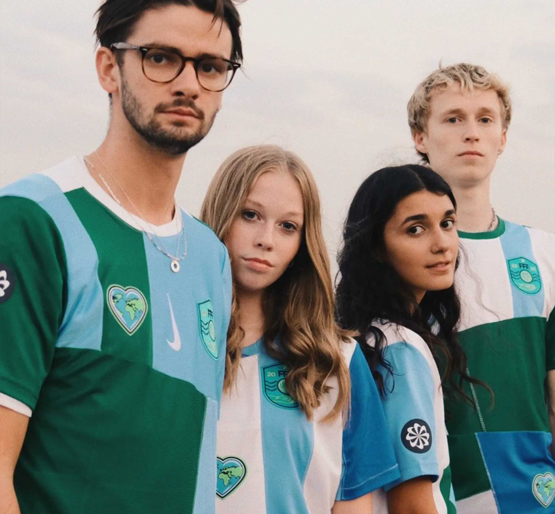 Young people in football kits