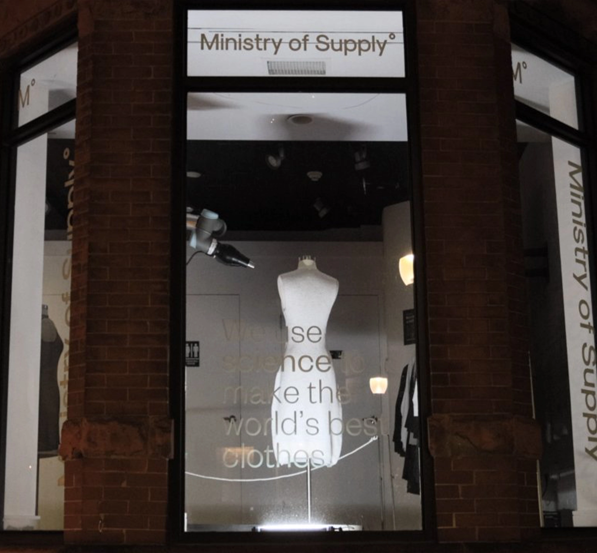 Ministry of Supply shop window at night