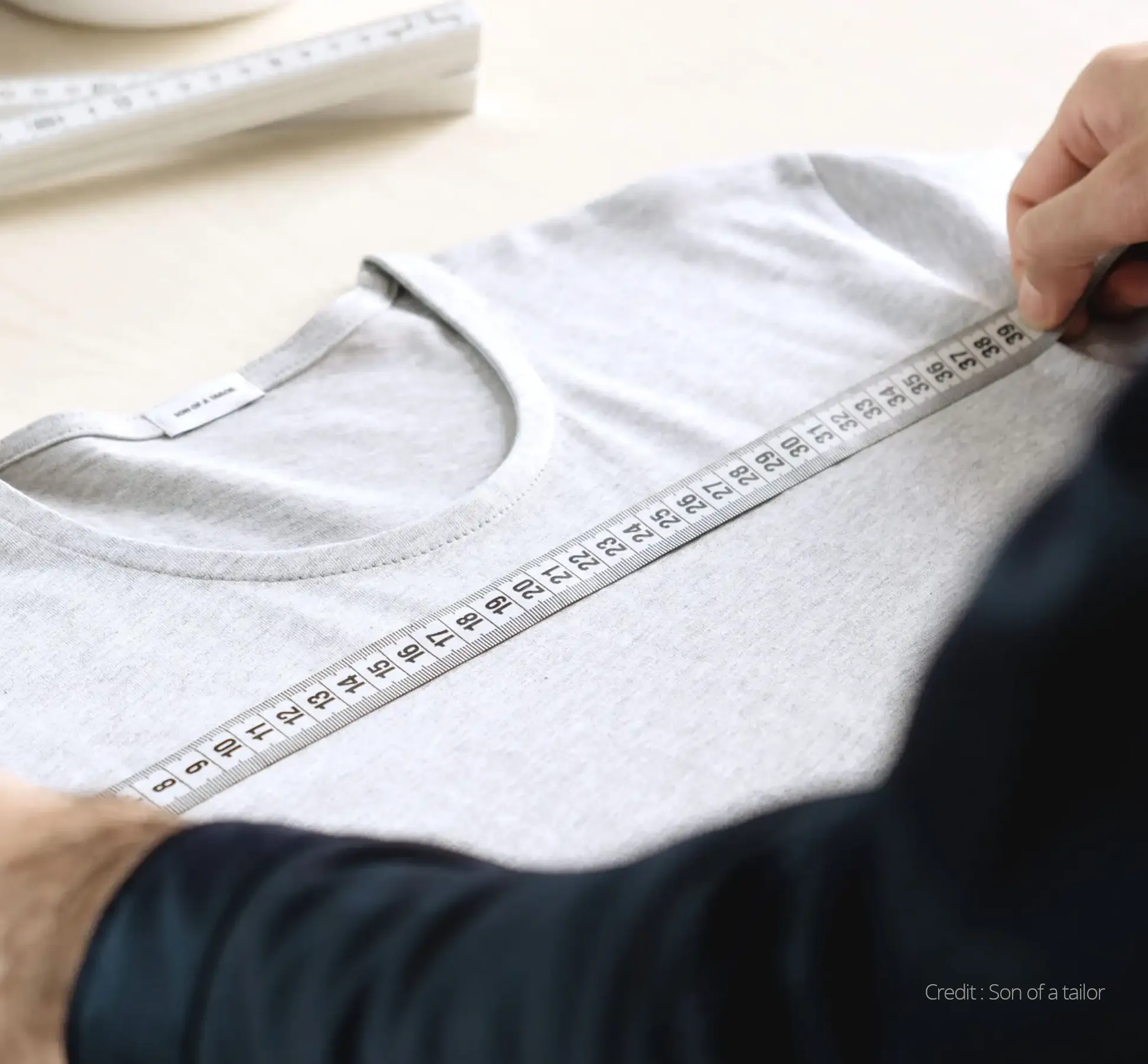 A white T-shirt being made to measure