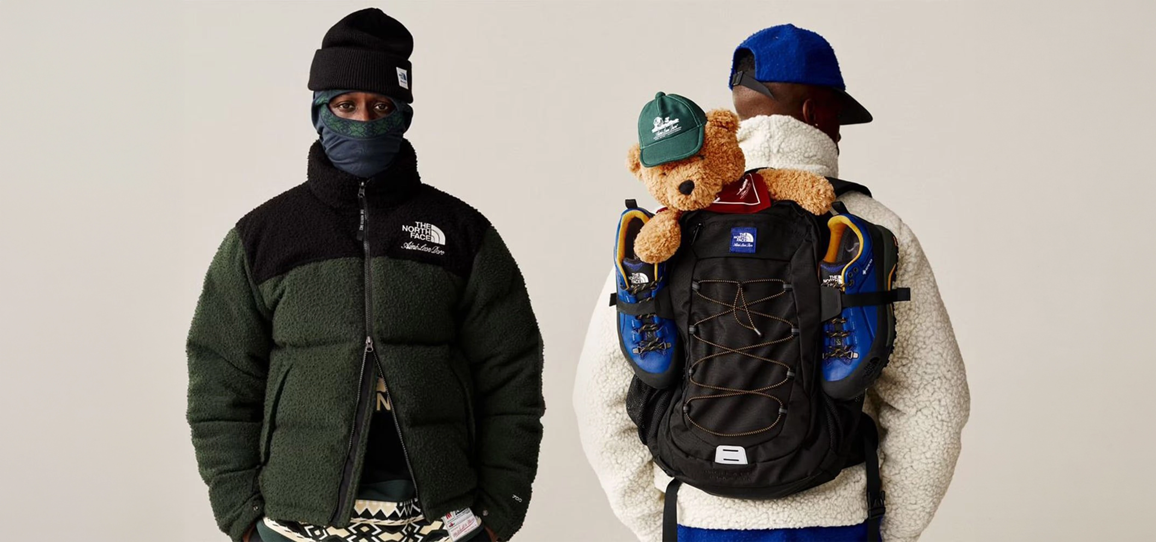 2 people side by side wearing a northface jacket and backpack