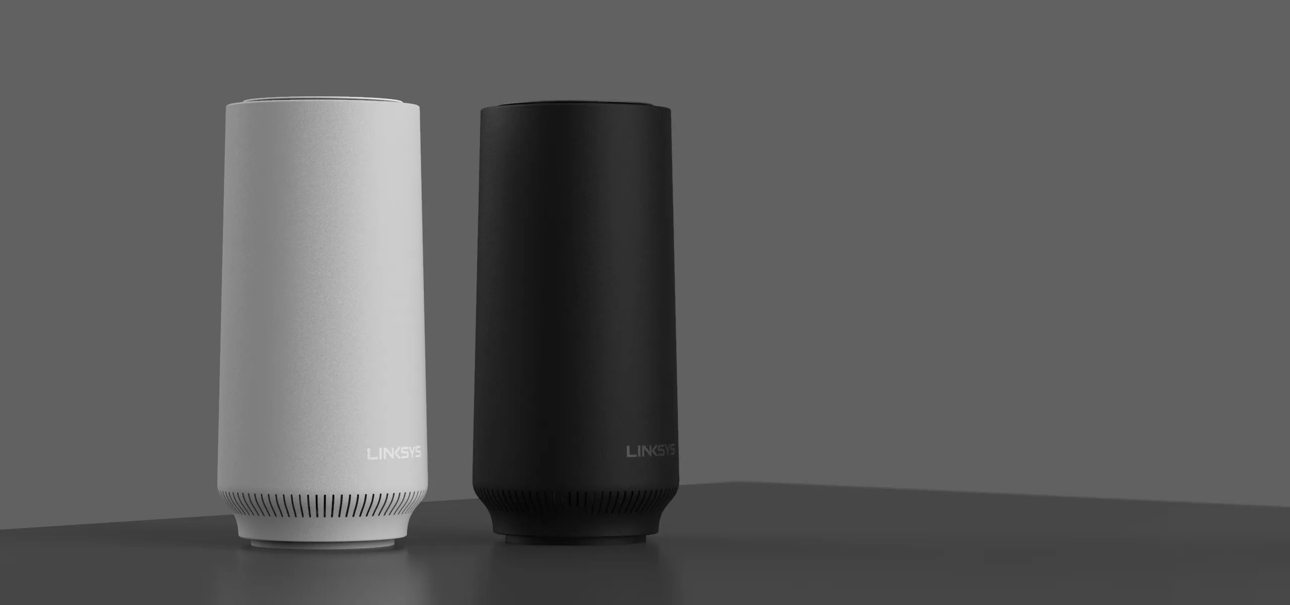 Cylindrical wifi router top detail in black and white