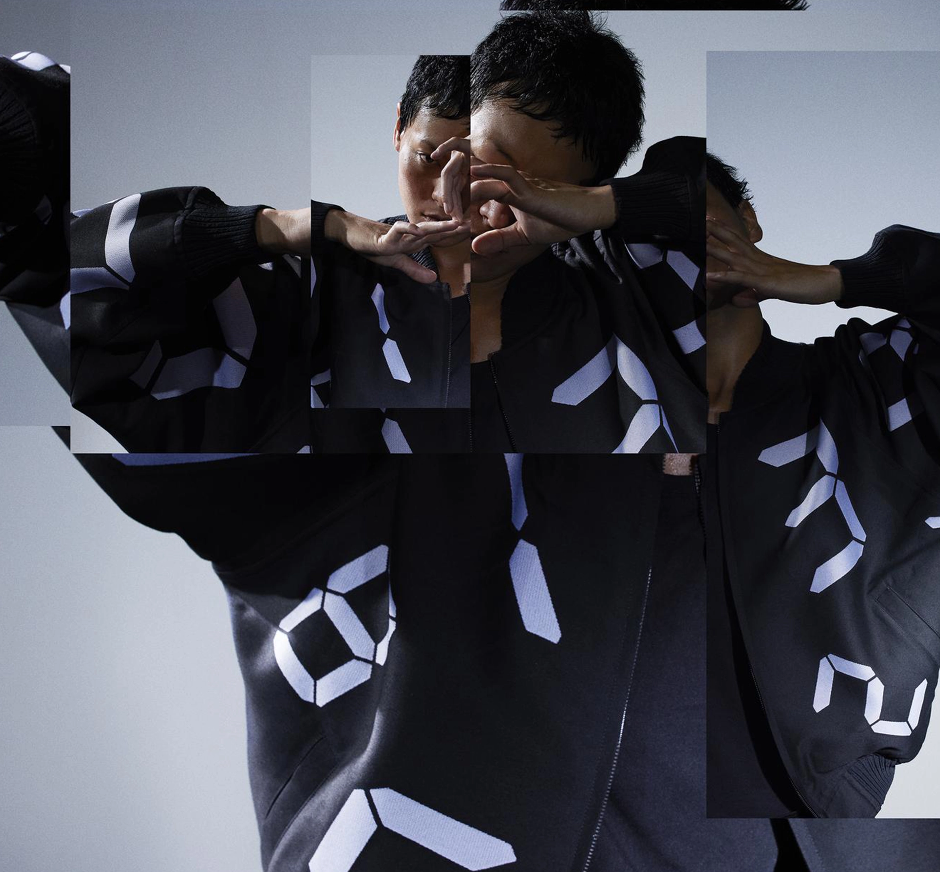 A model wearing a numbered pattern garment