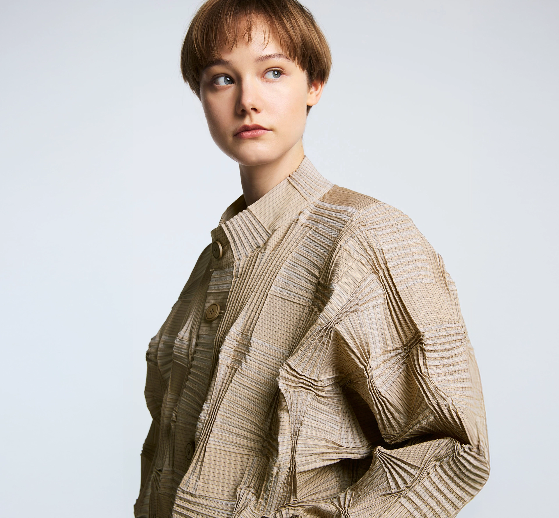 A model wearing a 3D knitted garment