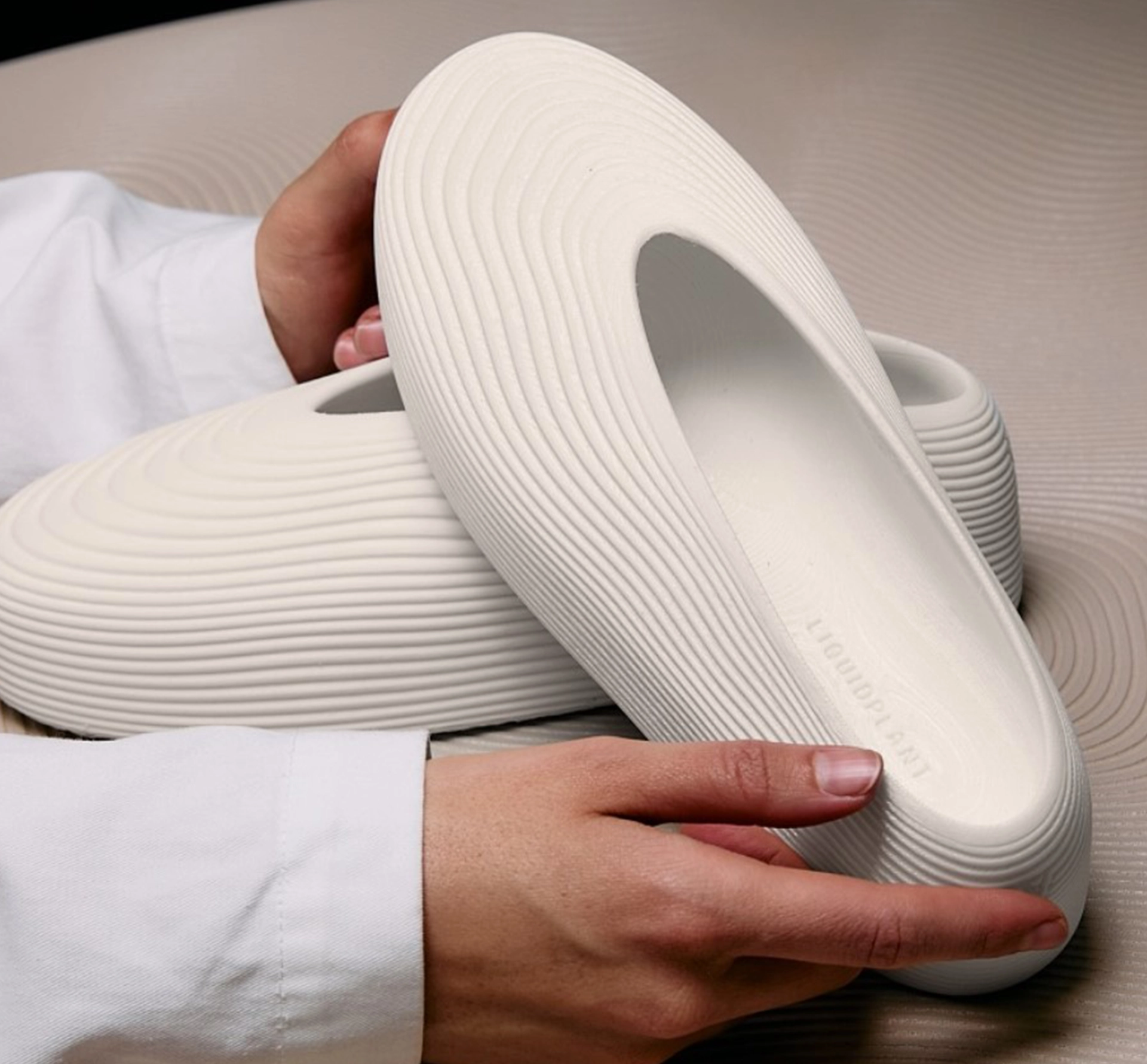 Textured shoes being held